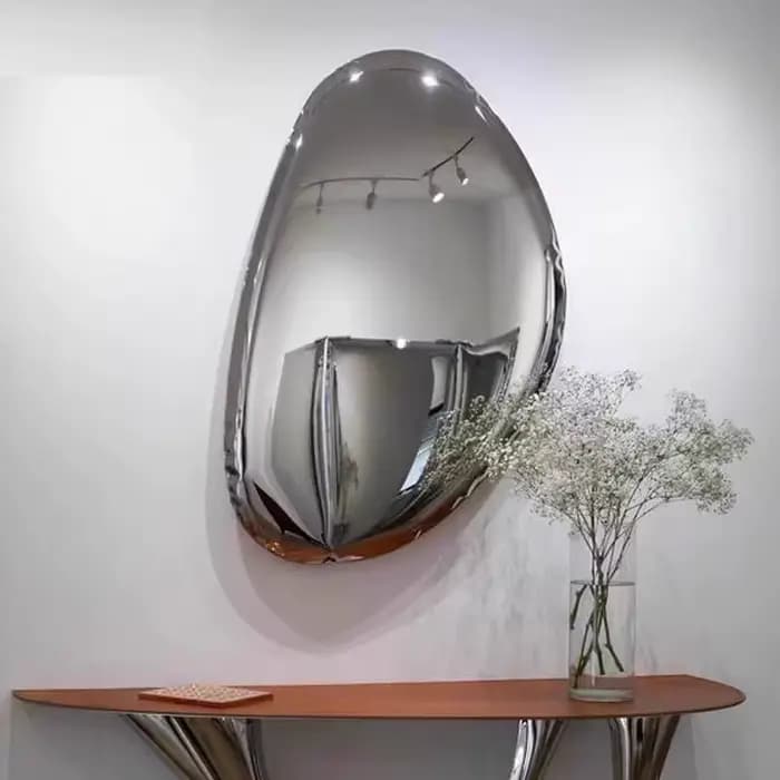 Miroir en acier inoxydable avec gouttelettes d'eau