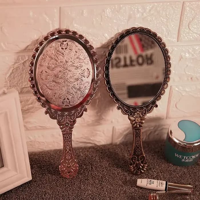 Miroir de vanité à main sculpté Vintage