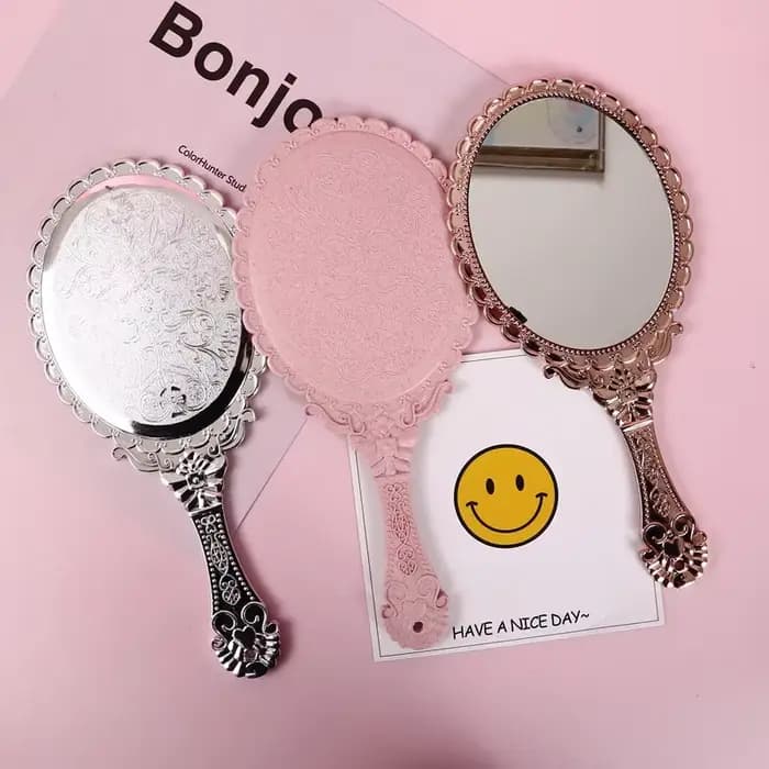 Miroir de vanité à main sculpté Vintage