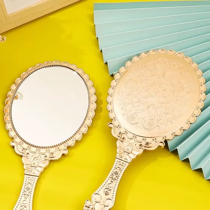 Miroir de maquillage portable à motif vintage