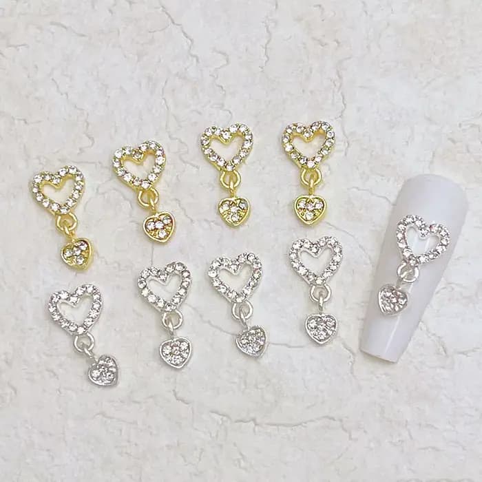10 pièces coeur balancent ongles breloques 3D alliage luxe ongles strass argent or creux coeur ongle