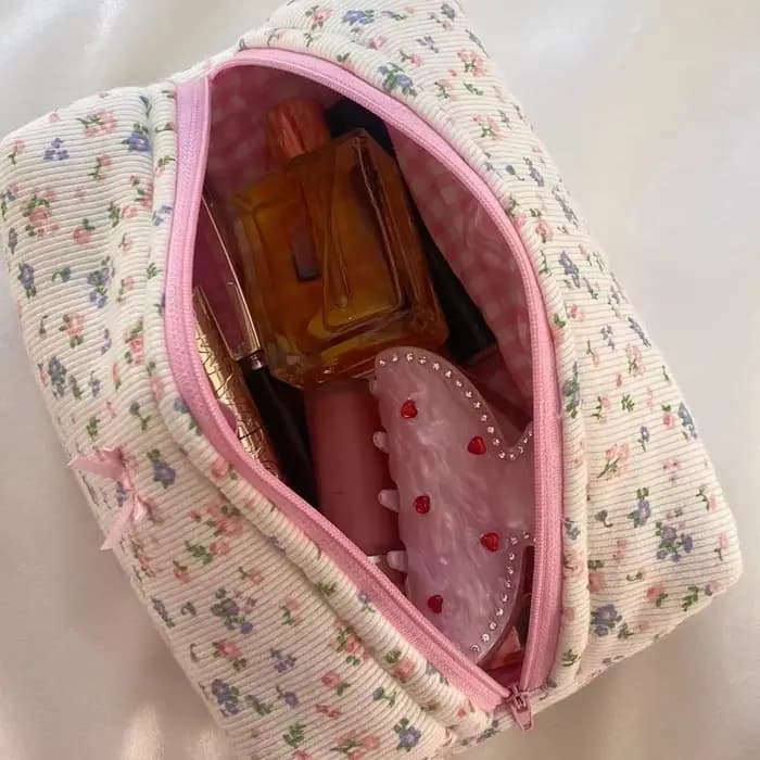 Trousse de maquillage florale matelassurera avec fermeture éclair