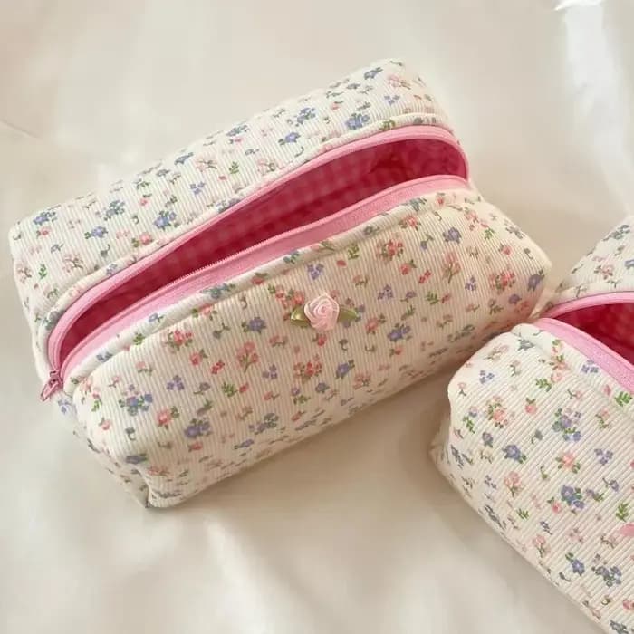 Trousse de maquillage florale matelassurera avec fermeture éclair