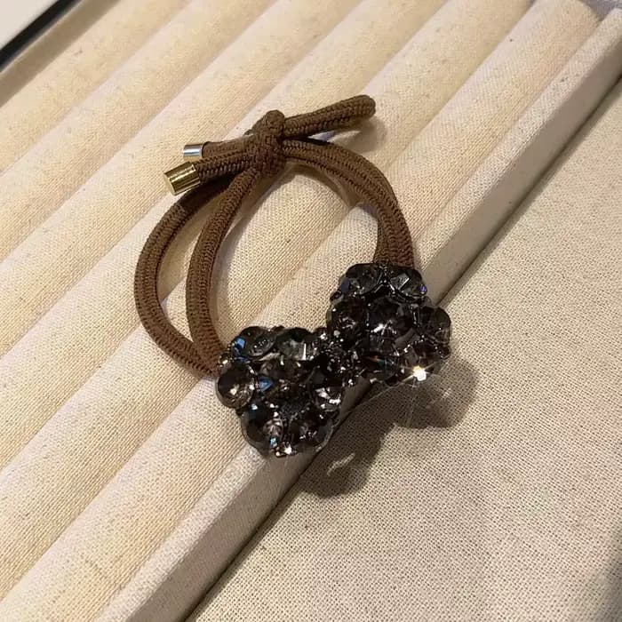 Attache de cheveux avec nœud en cristal de luxe, bandeau élastique Chic et minimaliste, accessoire de cheveux à la mode, corde de cheveux élégante pour femmes