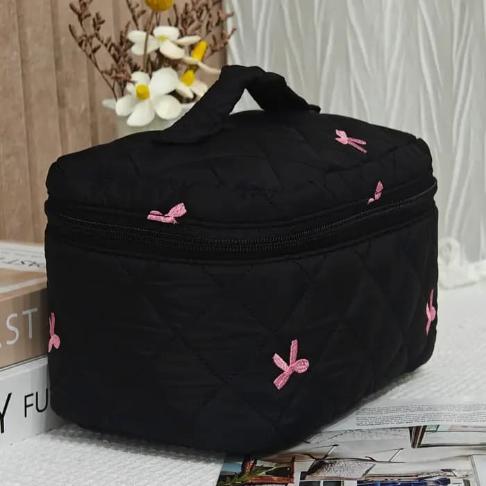 Trousse de maquillage artisanale avec broderie d'arcs