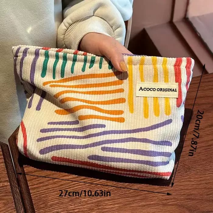 Pochette cosmétique en velours côtelé à rayures colorées