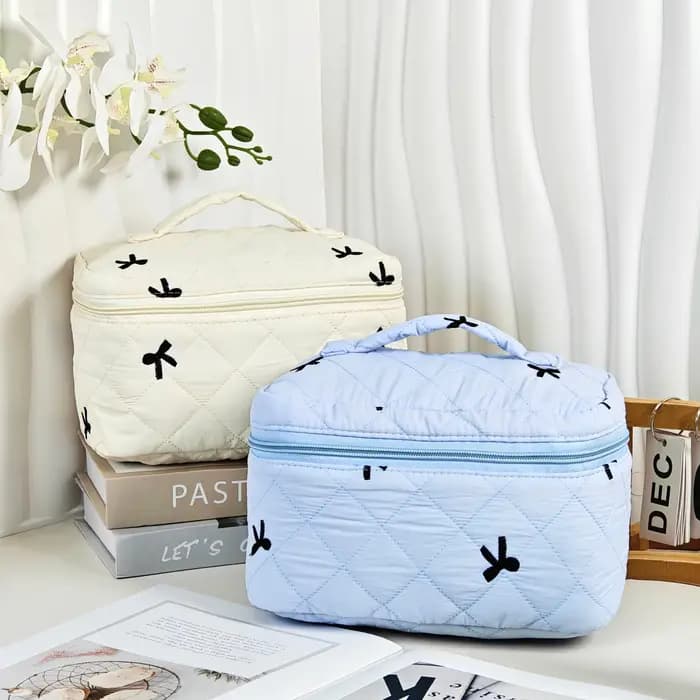Trousse de maquillage artisanale avec broderie d'arcs