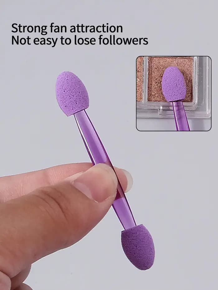 50 bâtonnets de fard à paupières en éponge double tête violettes.