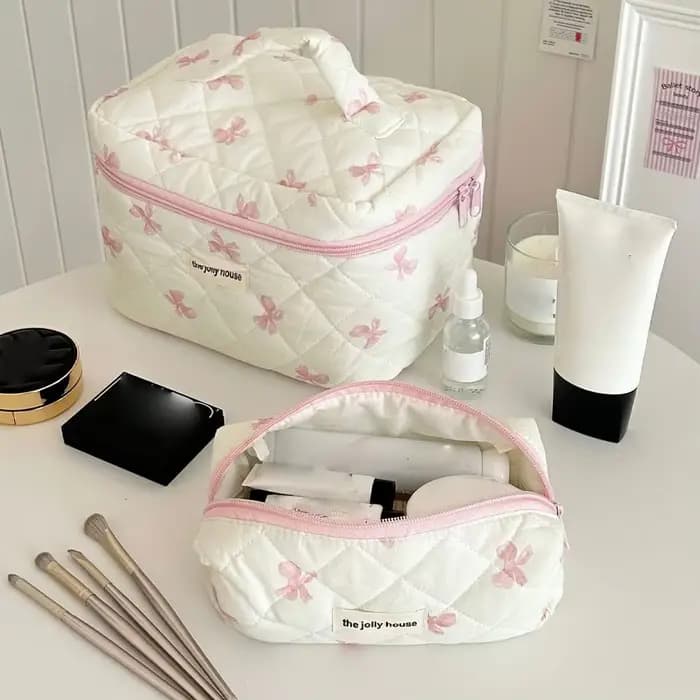 Trousse de maquillage matelassée à nœud blanc