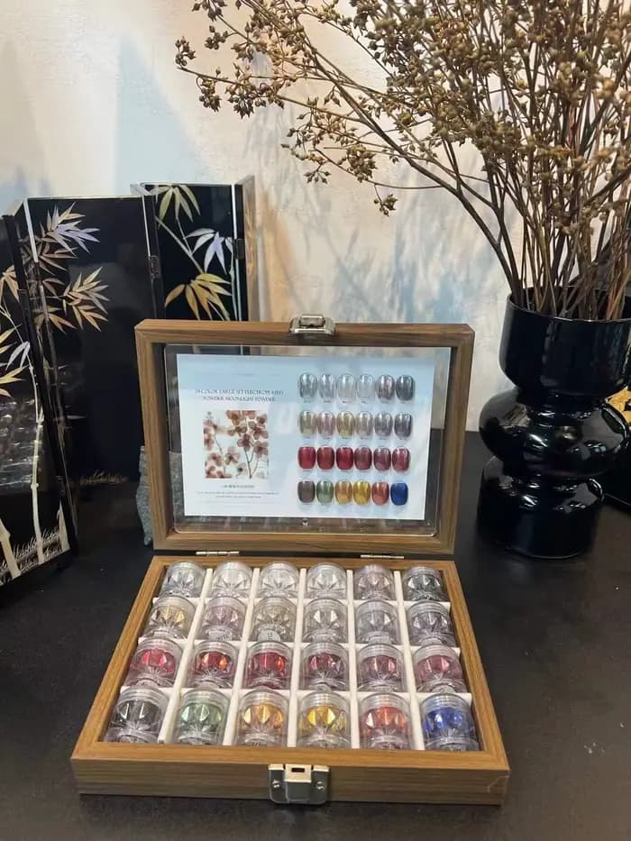 Ensemble de poudre miroir pour nail art rouge 24 couleurs avec cartes de couleurs et boîte de rangement. Art des ongles DIY, art des ongles artistique, charmant et beau