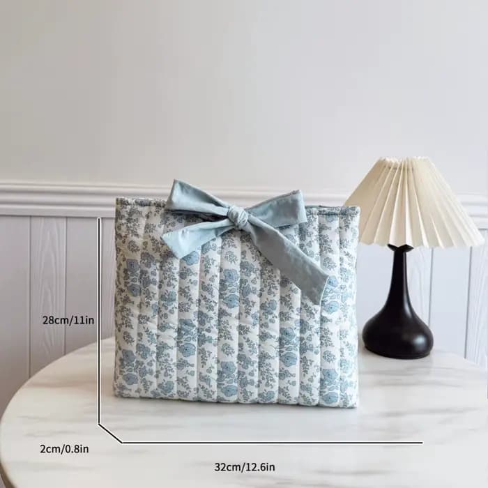 Trousse de maquillage matelassée florale avec nœud