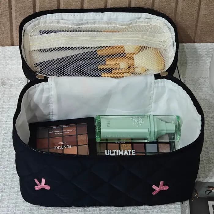 Trousse de maquillage artisanale avec broderie d'arcs