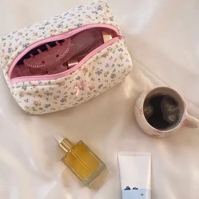 Trousse de maquillage florale matelassurera avec fermeture éclair