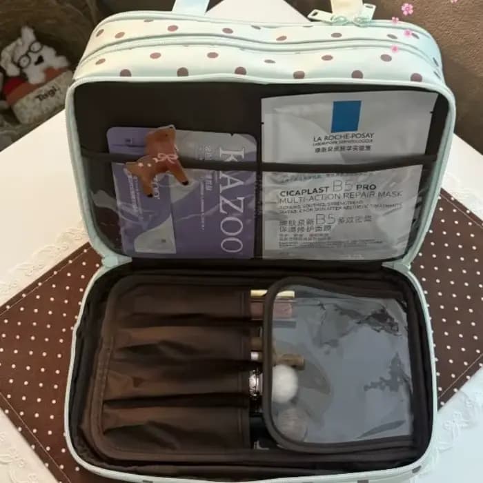Trousse de toilette de voyage portable à pois