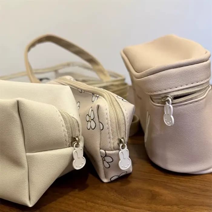 Ensemble de quatre trousses de maquillage Miffy Kawaii pour le voyage, sac de rangement portable à main, sac de classification pour articles de toilette, jouet cadeau