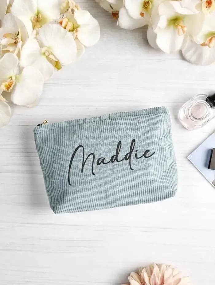 Trousse de maquillage en velours côtelé brodée