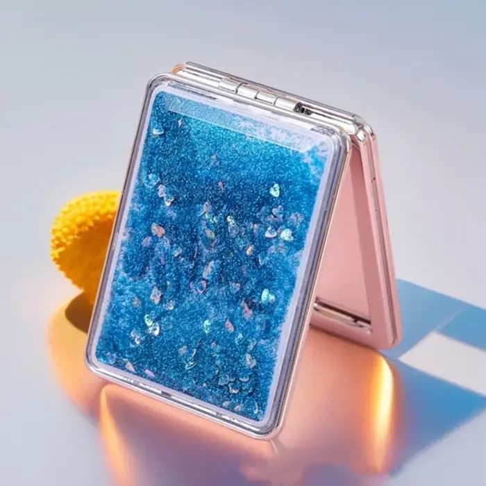 Miroir compact à paillettes liquides