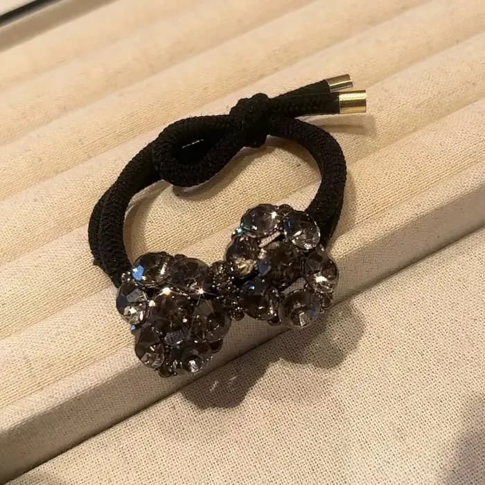 Attache de cheveux avec nœud en cristal de luxe, bandeau élastique Chic et minimaliste, accessoire de cheveux à la mode, corde de cheveux élégante pour femmes