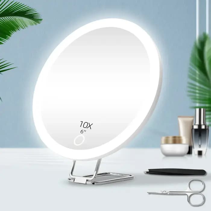 Miroir grossissant portable avec lumière