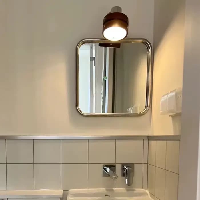 Miroir mural décoratif avec cadre en acier inoxydable