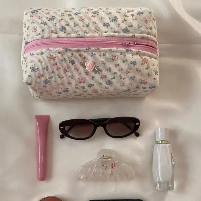 Trousse de maquillage florale matelassurera avec fermeture éclair