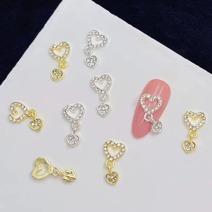 10 pièces coeur balancent ongles breloques 3D alliage luxe ongles strass argent or creux coeur ongle