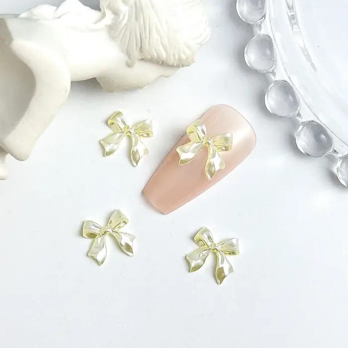50pcs 3D doux nacré brillant ruban arc résine ongles breloques ballerine nœud papillon Nail Art décoration