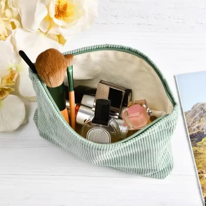 Trousse de maquillage en velours côtelé brodée