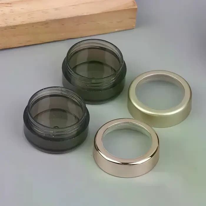 Bouteille transparente en plastique à paillettes