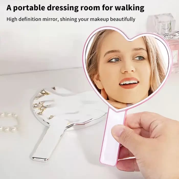 1 pièce Miroir de maquillage portable en forme de cœur avec poignée pour femme