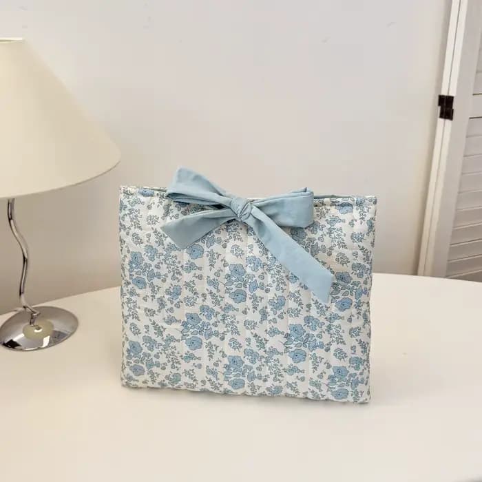 Trousse de maquillage matelassée florale avec nœud
